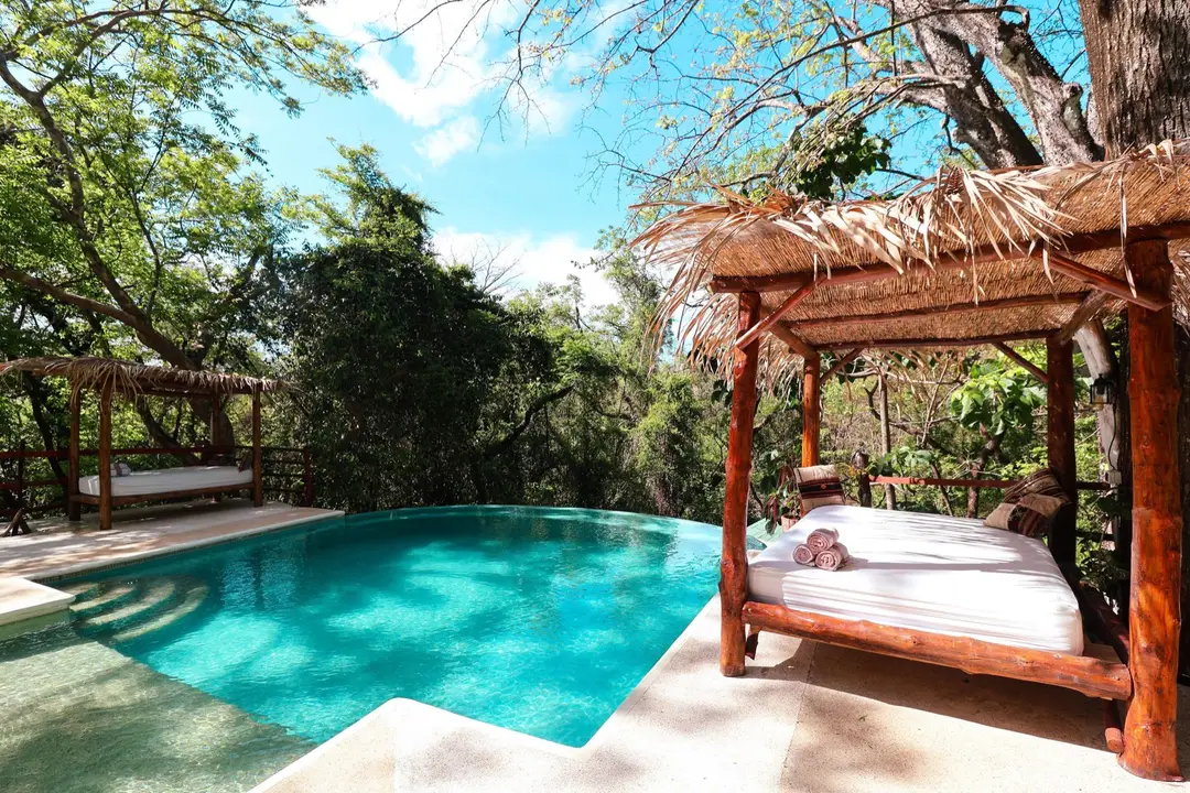 The pool and daybed at Naya Nosara